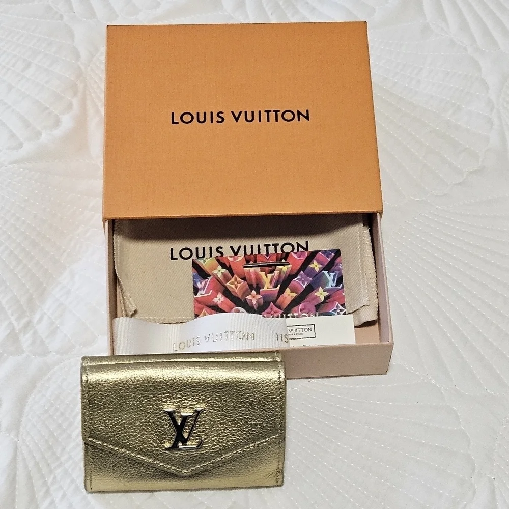 LOUIS VUITTON Portefeuille lock mini Compact Wallet Trifold Leather